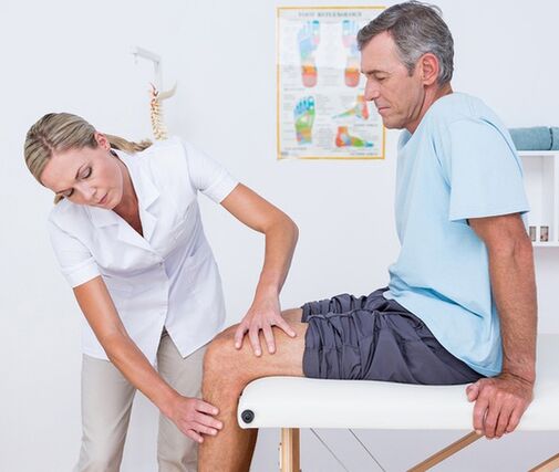 The doctor performs a visual examination and palpation on the patient with knee pain
