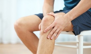 symptoms of knee arthrosis