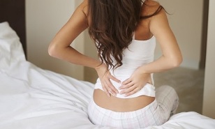 why the back hurts in the lumbar region